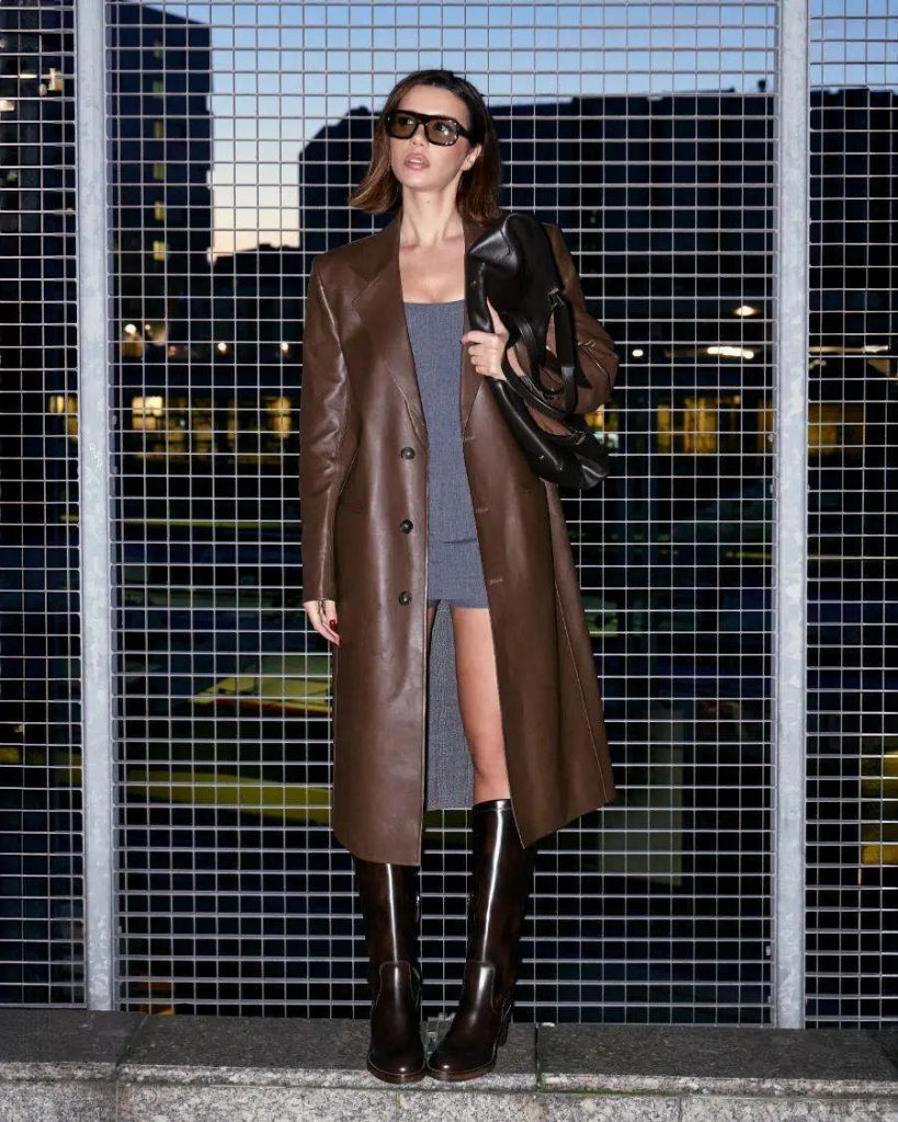 TOTEME draped jacket with a SAINT LAURENT cashmere sweater, finished with Ashley suede boots or a KHAITE suede tote